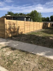 Cedar fence with Postmaster Steel Posts