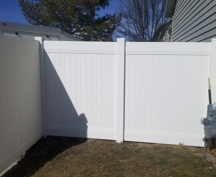 White vinyl privacy fence in Sandy